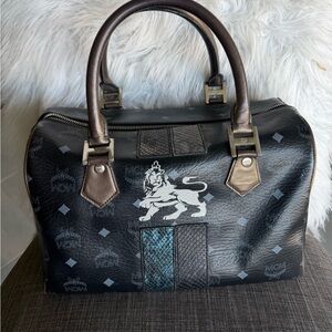 MCM vintage princess lion satchel